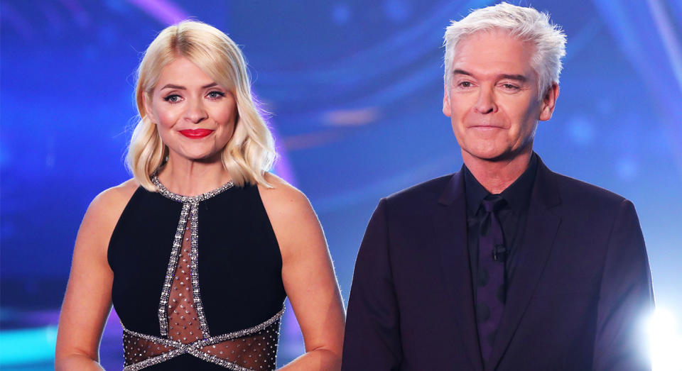 Holly Willoughby wore a cleavage baring dress on Dancing On Ice. [Photo: Rex]