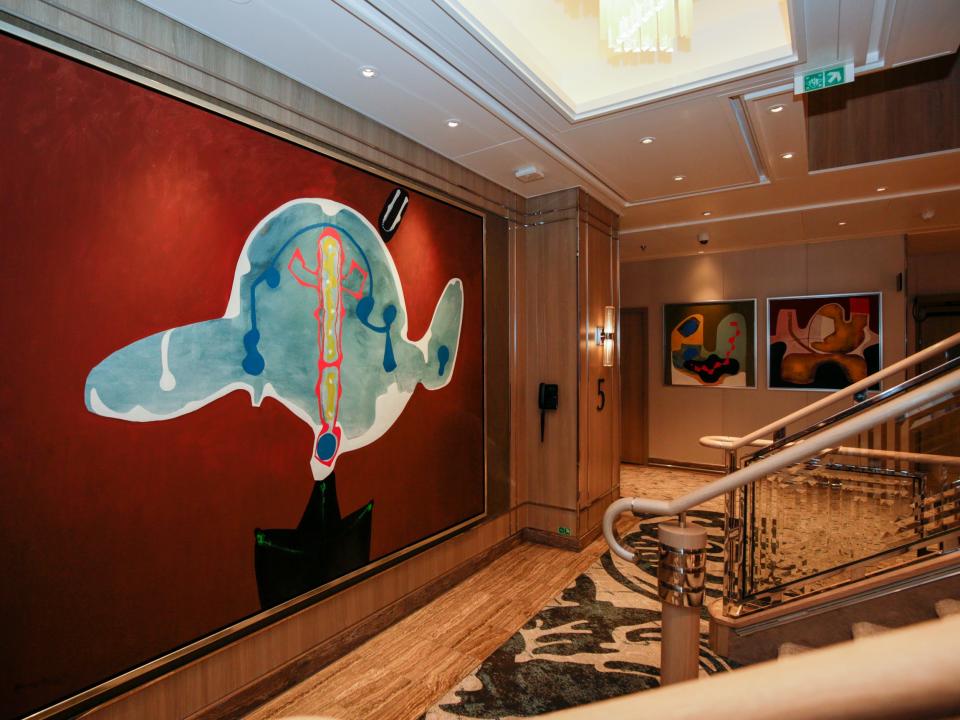 Staircase and art in the Oceania Vista