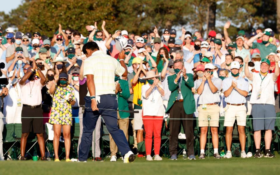 Japan's Hideki Matsuyama celebrates on the 18th green after winning The Masters - Reuters