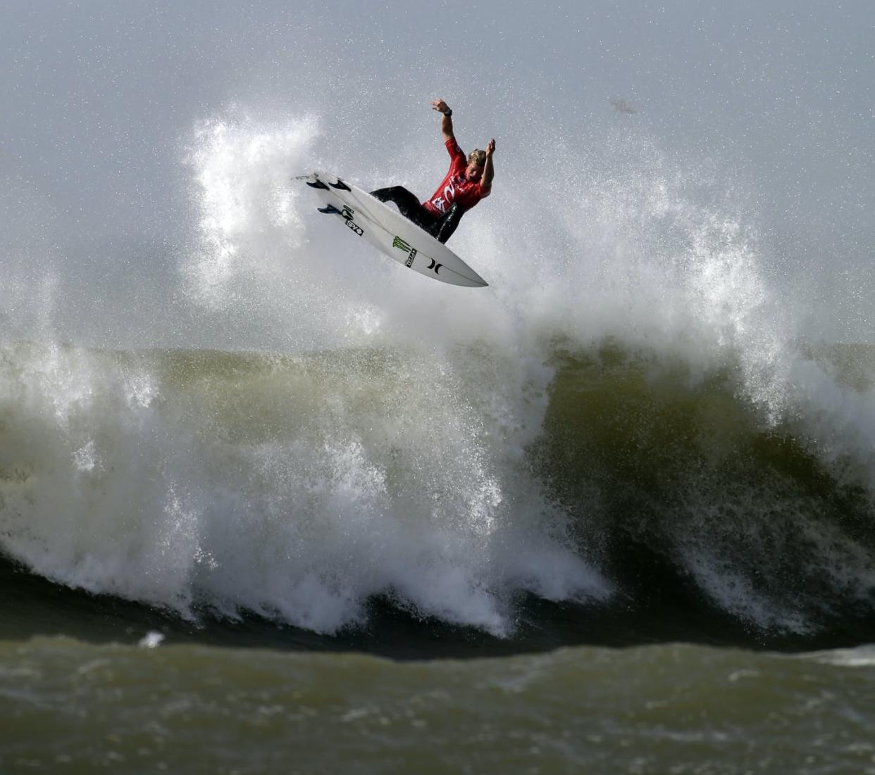 <span class="caption">Hawaiian surfer John John Florence, seen here competing in Portugal, is one of the favorites to win surfing's first Olympic gold. </span> <span class="attribution"><a class="link " href="https://newsroom.ap.org/detail/PortugalSurf/28db9b5fff044e9186c7db8caa8d855f/photo?Query=surfing%20john%20florence&mediaType=photo&sortBy=&dateRange=Anytime&totalCount=18&currentItemNo=0" rel="nofollow noopener" target="_blank" data-ylk="slk:AP Photo/Francisco Seco;elm:context_link;itc:0;sec:content-canvas">AP Photo/Francisco Seco</a></span>