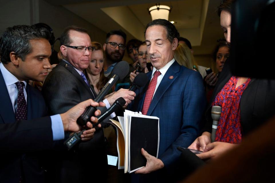 Rep. Jamie Raskin, D-Md., holds up documents as he talks with reporters on Capitol Hill in Washington, Wednesday, Oct. 2, 2019.