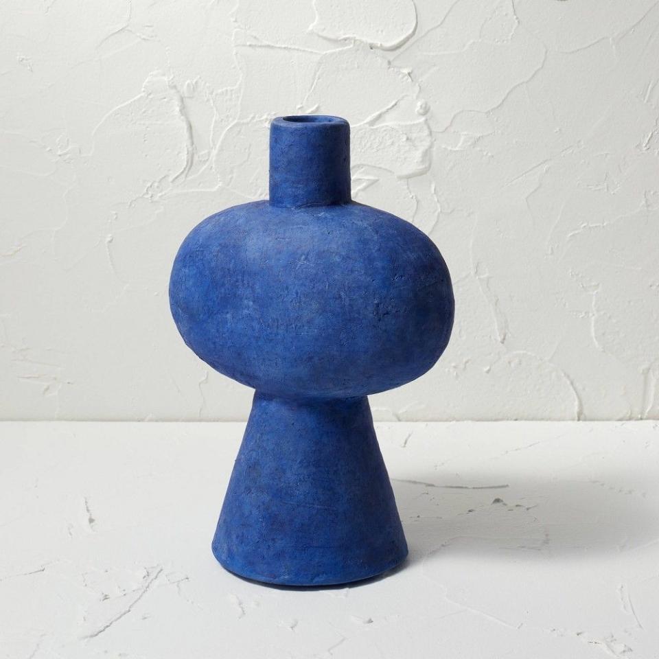 <p><a href="https://go.redirectingat.com?id=74968X1596630&url=https%3A%2F%2Fwww.target.com%2Fp%2Fceramic-figural-vase-blue-opalhouse-8482-designed-with-jungalow-8482%2F-%2FA-86510564&sref=https%3A%2F%2Fwww.housebeautiful.com%2Fshopping%2Fbest-stores%2Fa44689007%2F18-things-designers-always-buy-at-target%2F" rel="nofollow noopener" target="_blank" data-ylk="slk:Shop Now;elm:context_link;itc:0;sec:content-canvas" class="link ">Shop Now</a></p><p>Ceramic Figural Vase Blue - Opalhouse™ designed with Jungalow™</p><p>target.com</p><p>$25.00</p>