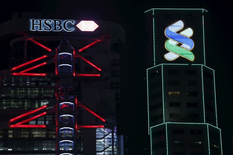 An exterior view of HSBC headquarters and Standard Chartered Bank are seen at the financial Central district in Hong Kong