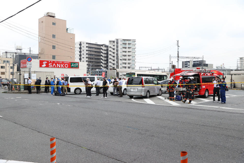 A general view shows workers at the scene after an attack on Japan's former prime minister Shinzo Abe at Kintetsu Yamato-Saidaiji station square in Nara on July 8, 2022. - Former Japanese prime minister Shinzo Abe was attacked and left bleeding at a campaign event in the Nara region on July 8, local media reported. - Japan OUT (Photo by JIJI PRESS / AFP) / Japan OUT (Photo by STR/JIJI PRESS/AFP via Getty Images)