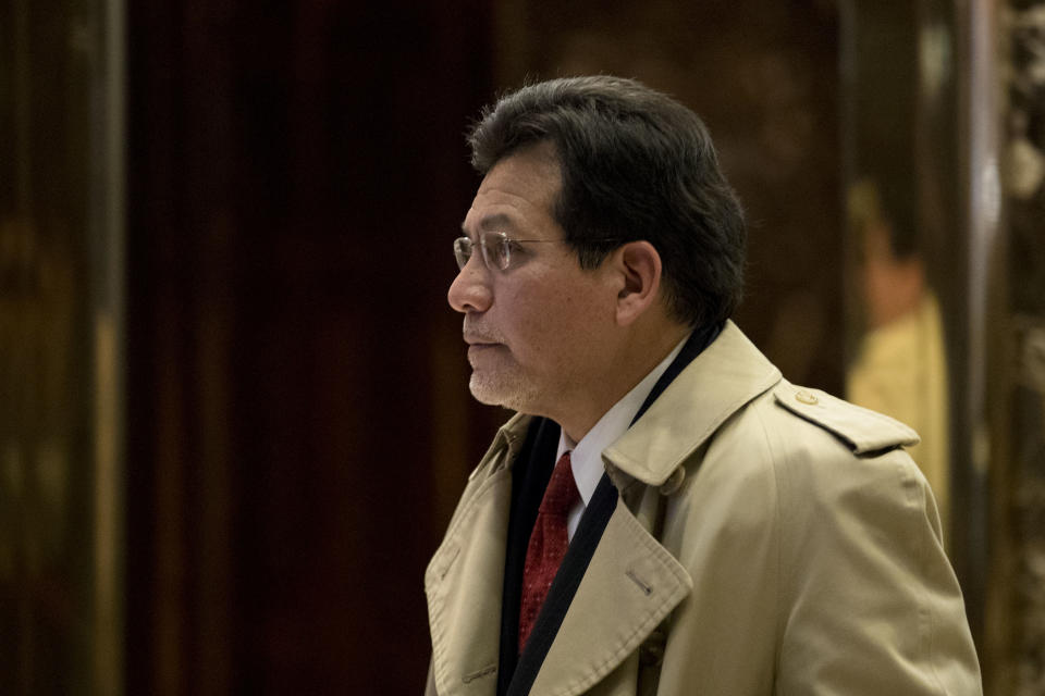 Former U.S. Attorney General Alberto Gonzales exits Trump Tower in New York City in December 2016. (Photo: Drew Angerer/Getty Images)