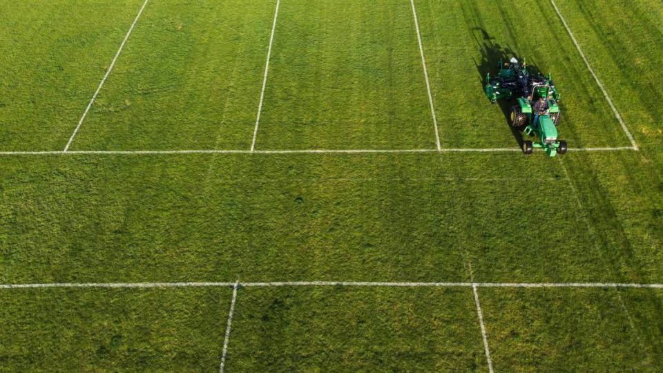 Boise Parks & Recreation crews mow the grass fields at Optimist Youth Sports Complex on Thursday. Boise has about 2,000 employees, who make on average $27.15 per hour.