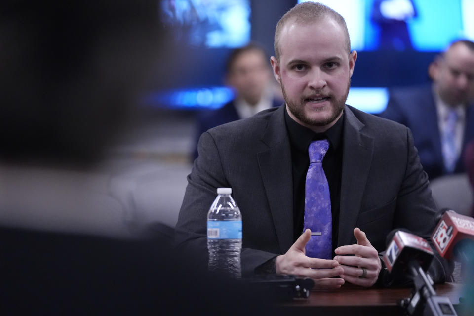 Officer Jordan Jandreau, of the Rockland Police Department, gives testimony Thursday, March 7, 2024, in Augusta, Maine, during a hearing of the independent commission investigating the law enforcement response to the mass shooting in Lewiston, Maine. (AP Photo/Robert F. Bukaty)