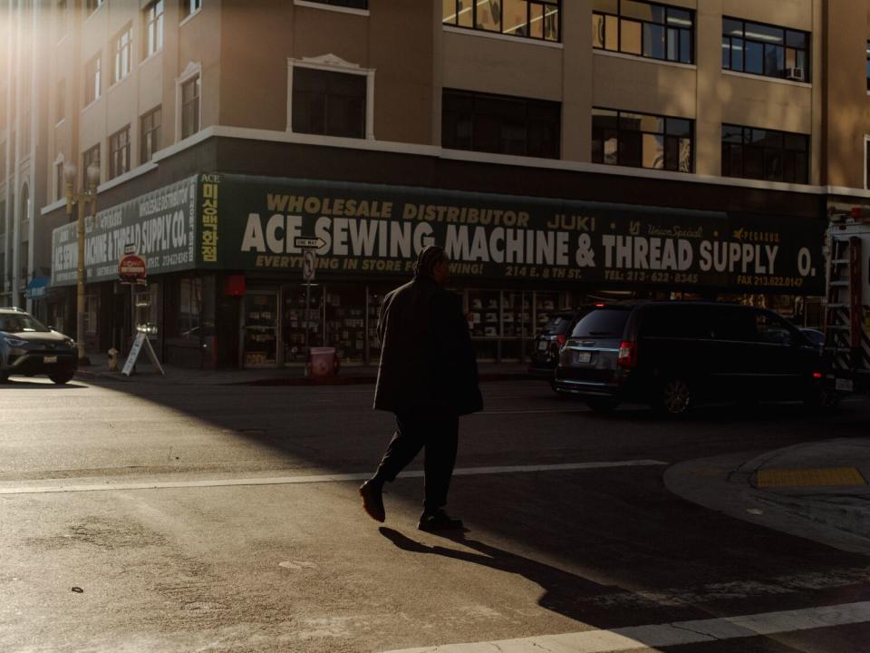 Rick Garzon crossing the street in Downtown L.A.