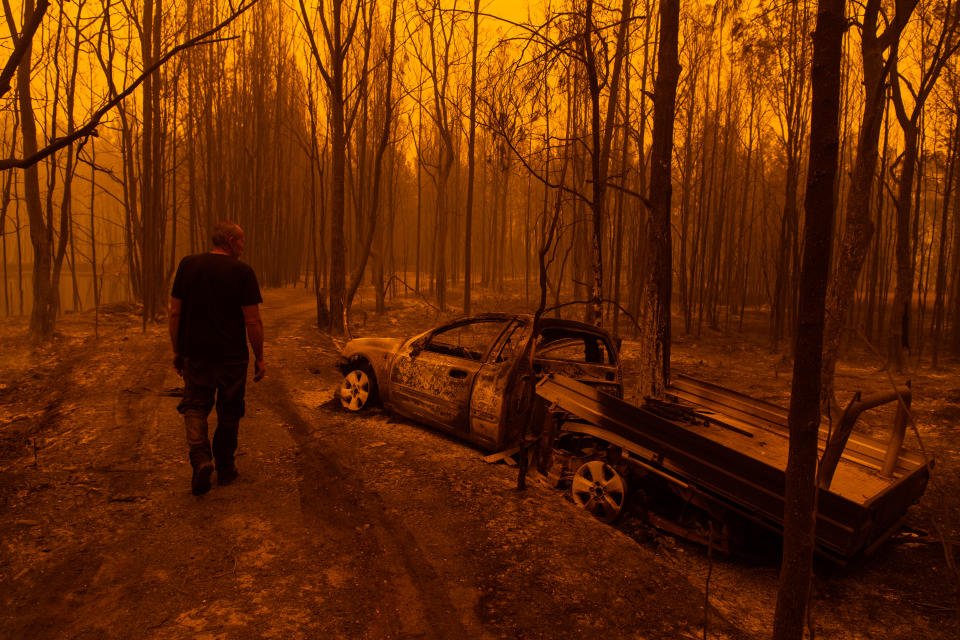 MOGO, Australia - December 31, 2019: Grant, a resident of the small town of Mogo on the NSW south coast, survived a devastating bushfire by submerging himself in a dam for an hour as the fires raged overhead, December 31, 2019. He was driving to his property when thick smoke forced him off the road and sent him crashing into a tree. The fires engulfed his car. (Photo by James Brickwood/The Sydney Morning Herald via Getty Images)