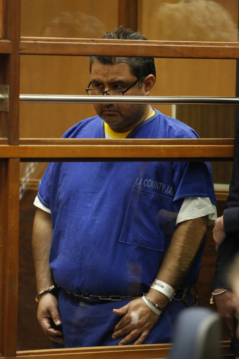 Naason Joaquin Garcia, appears in court in Los Angels, Calif. on Monday, June 10, 2019. García, and his co-defendants face a 26-count felony complaint that alleges crimes including child rape, statutory rape, molestation, human trafficking, child pornography and extortion. The charges detail allegations involving three girls and one woman between 2015 and 2018 in Los Angeles County. (Ringo Chiu/Pool Photo via AP)