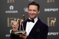 Ein bisschen weniger überraschend ist der Job, den "Wolverine" Hugh Jackman einst ausübte: Der stets durchtrainierte Filmstar und stolze "Bambi"-Gewinner 2017 startete als Sportlehrer ins Berufsleben. (Bild: Andreas Rentz/Getty Images)