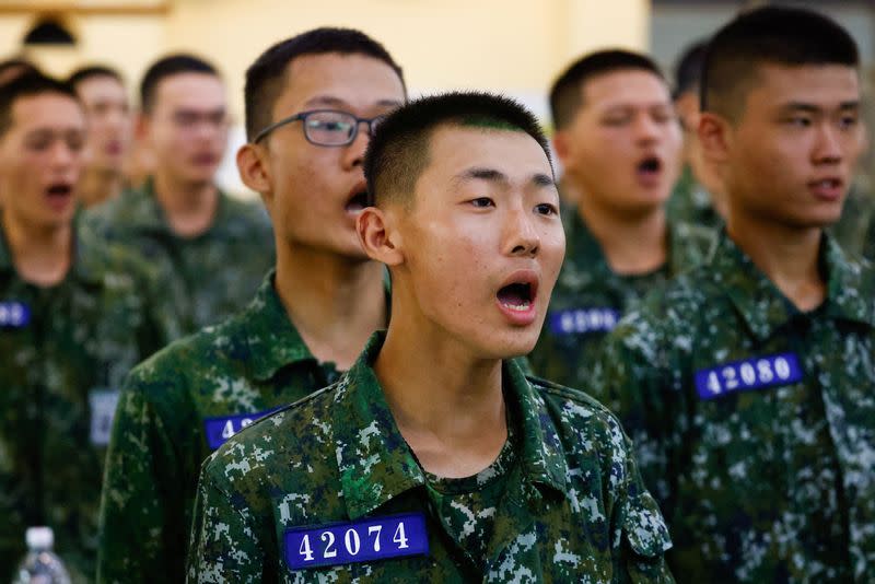 New military recruits welcome Taiwan President Lai Ching-te during his visit at a military camp in Taichung