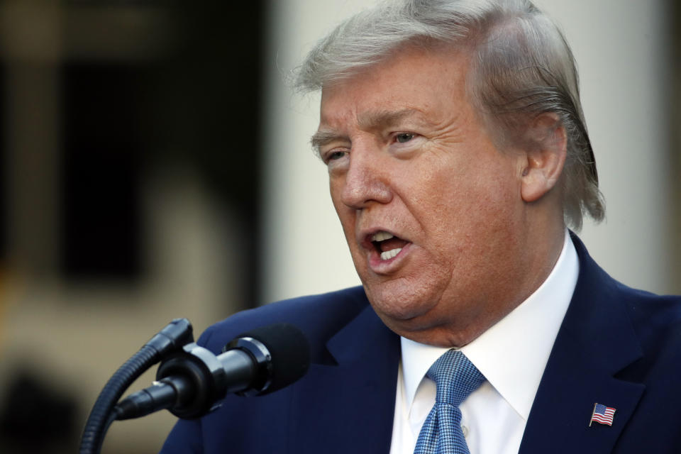 President Donald Trump speaks about the coronavirus in the Rose Garden of the White House, Wednesday, April 15, 2020, in Washington. (AP Photo/Alex Brandon)