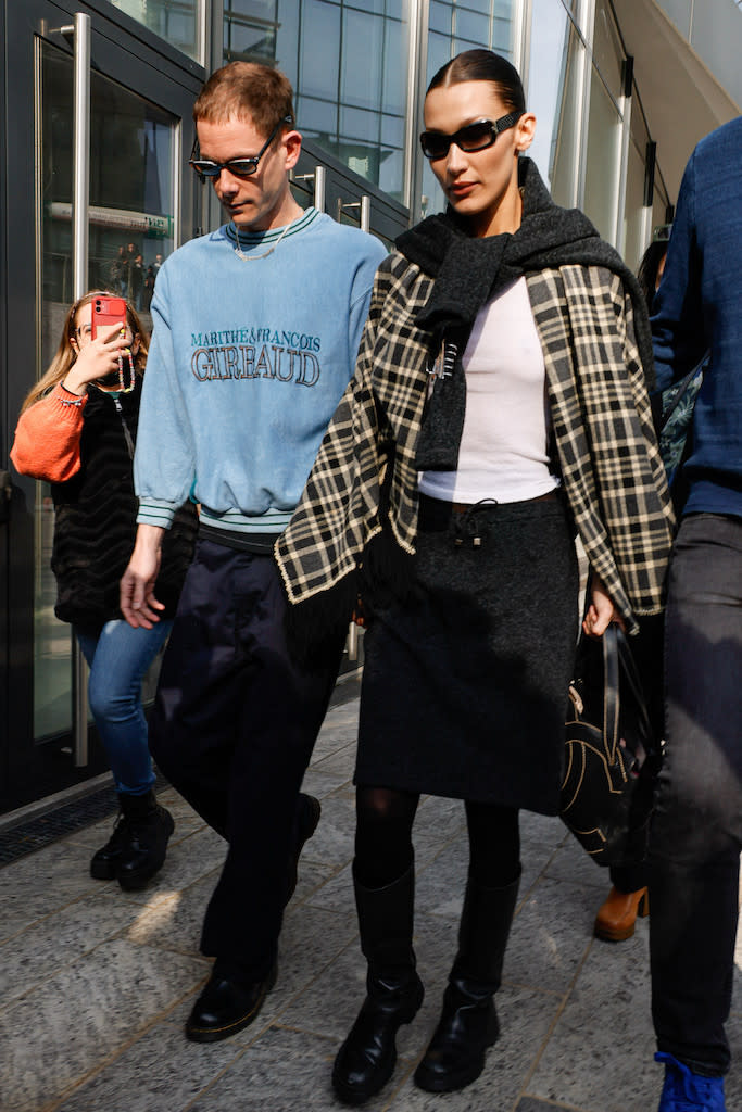 Bella Hadid with boyfriend Marc Kulman out and about during Milan Fashion Week on Feb. 23, 2022. - Credit: AbacaPress / SplashNews.com