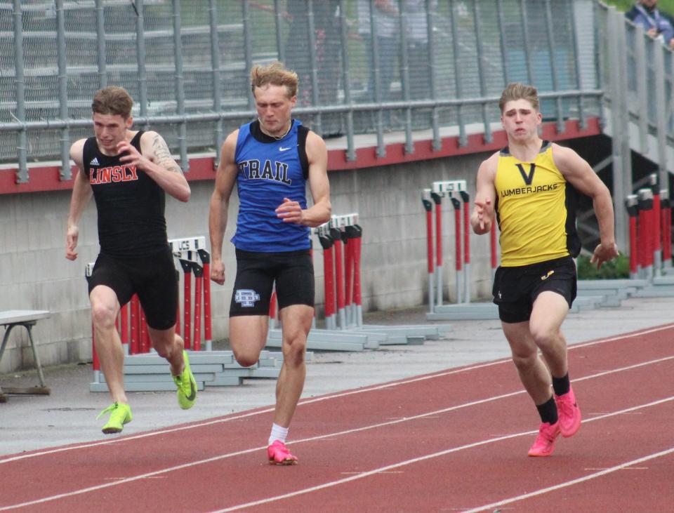 Buckeye Trail's Donovan Geiger sprints toward the finish in the 100-meter dash. Geiger came in third in Class 3A.