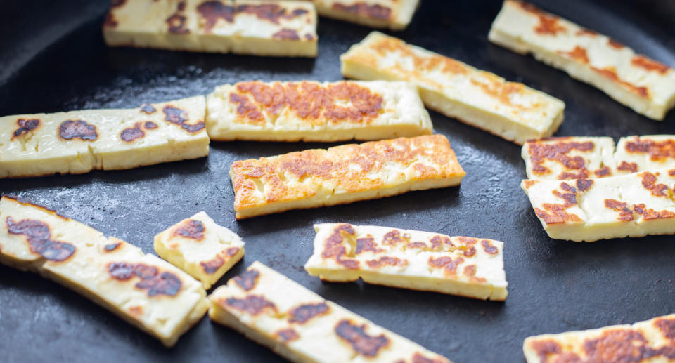 Haloumi on a fry pan.