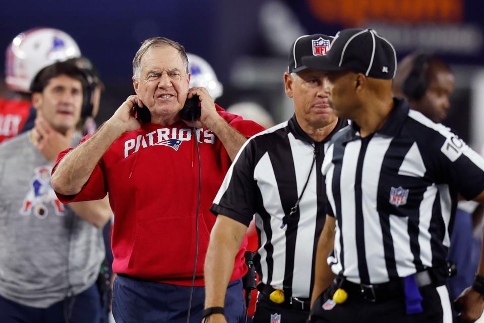 New England Patriots head coach Bill Belichick calls to officials during the first half of an NFL football game against the Miami Dolphins, Sunday, Sept. 17, 2023, in Foxborough, Mass. (AP Photo/Michael Dwyer)
