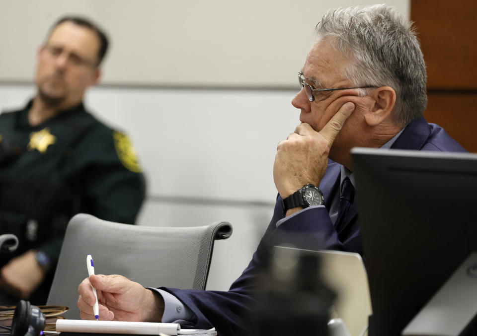 Former Marjory Stoneman Douglas High School School Resource Officer Scot Peterson is shown at the defense table during his trial, Thursday, June 8, 2023, at the Broward County Courthouse in Fort Lauderdale, Fla. Peterson is charged with child neglect and other charges for failing to stop the Parkland school massacre five years ago. (Amy Beth Bennett/South Florida Sun-Sentinel via AP, Pool)