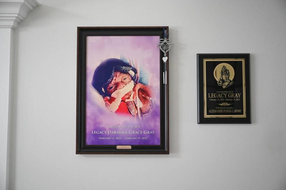 A framed photo and plaque of Legacy Gray are displayed prominently in the home of her mother LaChunda Hunter. Gray was born prematurely at Novant’s main hospital in Charlotte on Feb. 13, 2022. Six days later, Hunter was told the baby had died. Hunter said that what hospital doctors did next further traumatized her.