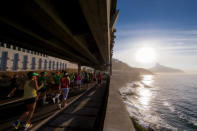 <p>Participants run through Elevado do Joa during the Rio de Janeiro Marathon, on May 29, 2016. <em>(Buda Mendes/Getty Images)</em> </p>