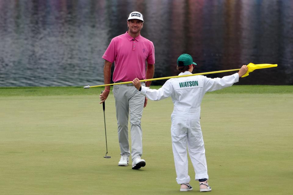 AUGUSTA, GEORGIA - APRIL 10: Bubba Watson of the United States and his son walk on the second green during the Par Three Contest prior to the 2024 Masters Tournament at Augusta National Golf Club on April 10, 2024 in Augusta, Georgia. (Photo by Jamie Squire/Getty Images) (Photo by Jamie Squire/Getty Images)