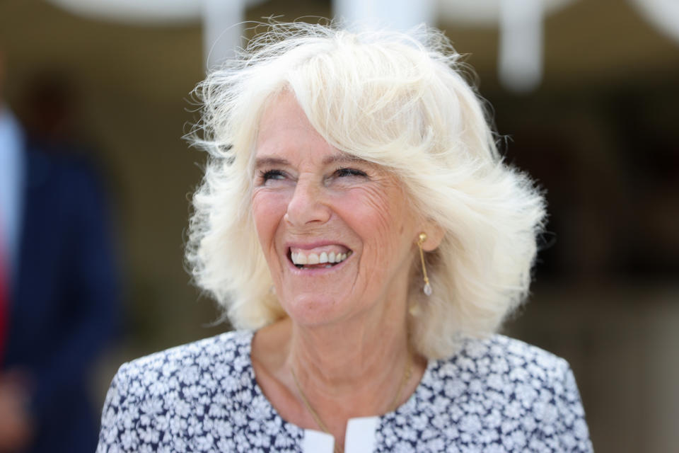 PONTYCLUN, WALES - JULY 07: Camilla, Duchess of Cornwall during a visit to Llanerch Vineyard on July 07, 2021 in Pontyclun, Wales. The Duchess has been President of Wines GB since 2011, of which the Llanerch vineyard is a member. Owner of Llanerch, geologist and entrepreneur Ryan Davies renovated the building and first opened to the public in July 2011. During the pandemic, Llanerch made a local farm shop delivery service. It launched overnight and helped the local community during the difficult time. The Duchess first tried Cariad wines when she visited Pendoylan and it was awarded the best kept village in Wales in the 90's. (Photo by Chris Jackson - WPA Pool/Getty Images)