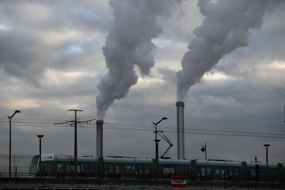 Smoke rise from a waste incinerator in Paris, France, Tuesday, Dec. 4, 2018. The COP24 summit on climate change is taking place in Poland's southern city of Katowice from December 2 to 14, 2018. (AP Photo/Francois Mori)