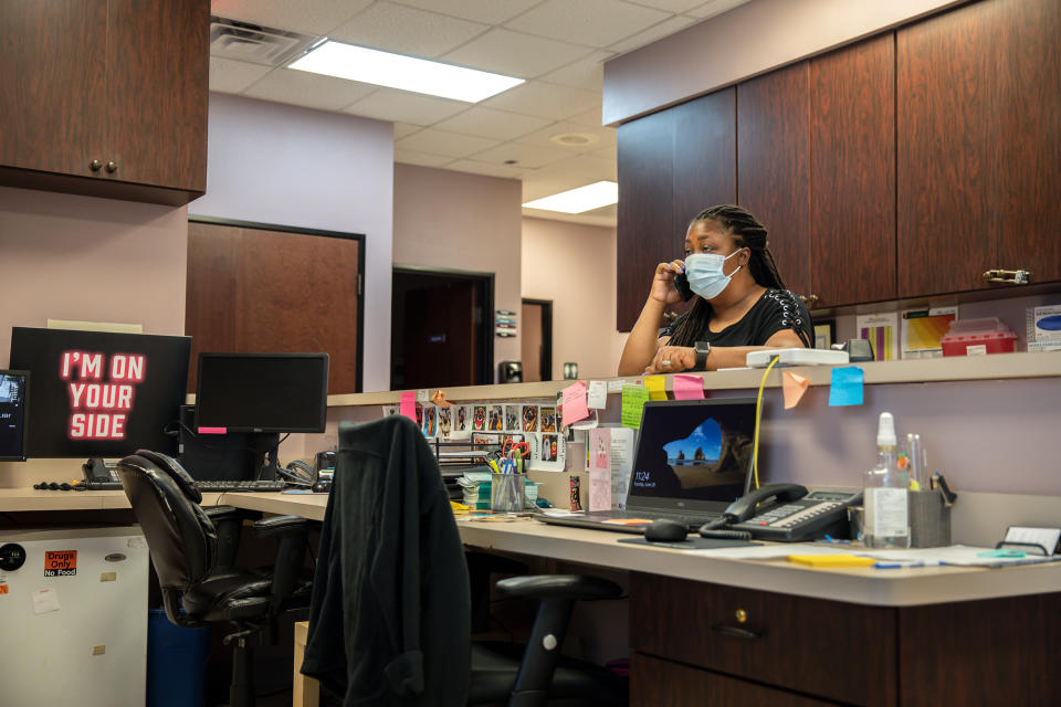 Marva Sadler, the director of clinical services for Whole Woman’s Health, calls the clinic's doctor to notify him that the clinic was granted a temporary restraining order to provide abortions for patients.  (Montinique Monroe for NBC News)