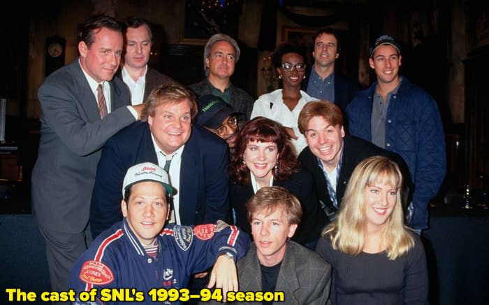 Lorne Michaels with the cast of SNL's 1993–94 season, including Phil Hartman, Mike Myers, Chris Farley, Dana Carvey, and Ellen Cleghorne