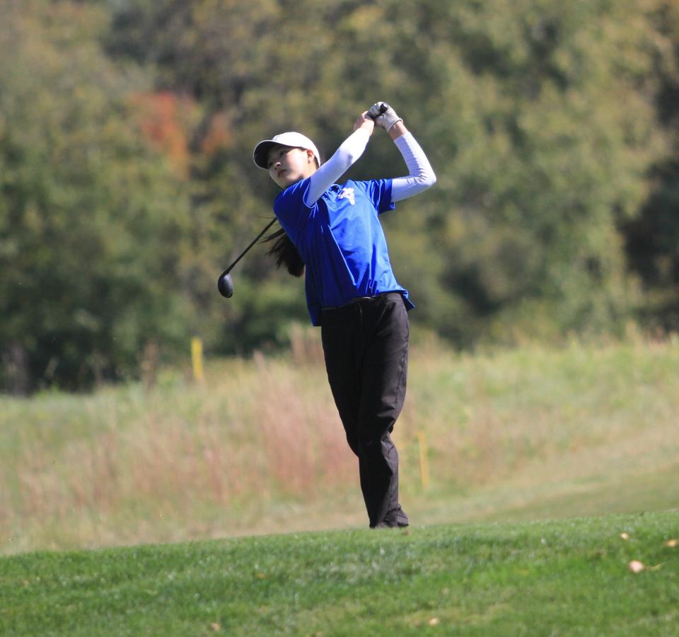 Olentangy's Meadow Tian watches her drive on No. 12 at The Links at Echo Springs during the Division I district tournament on Wednesday. Tian shot 74 to qualify for state.
