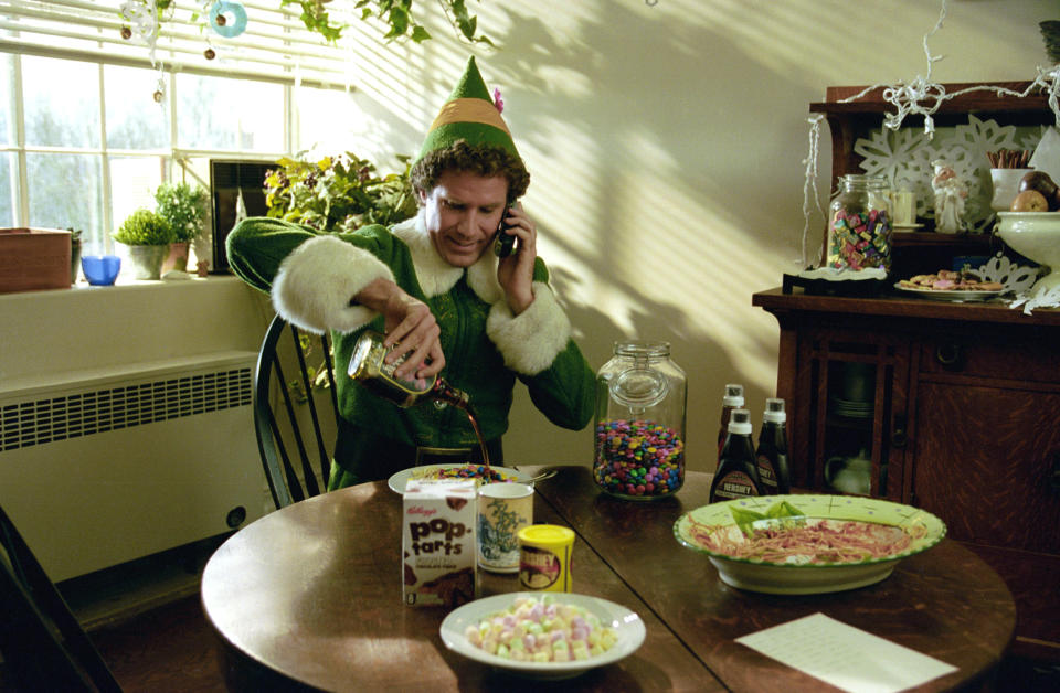 Buddy (Ferrell) enjoys a breakfast of champions in Elf (Photo: New Line/courtesy Everett Collection)