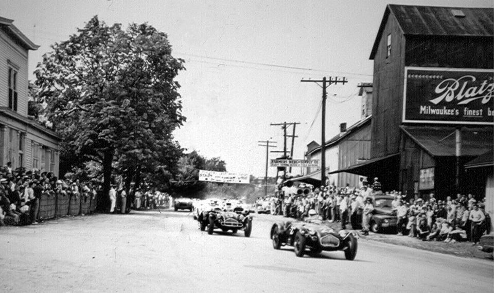 Road racing action during the 1950 race at Elkhart Lake before Road America was created.  Image preserved by the Sheboygan County Historical Research Center