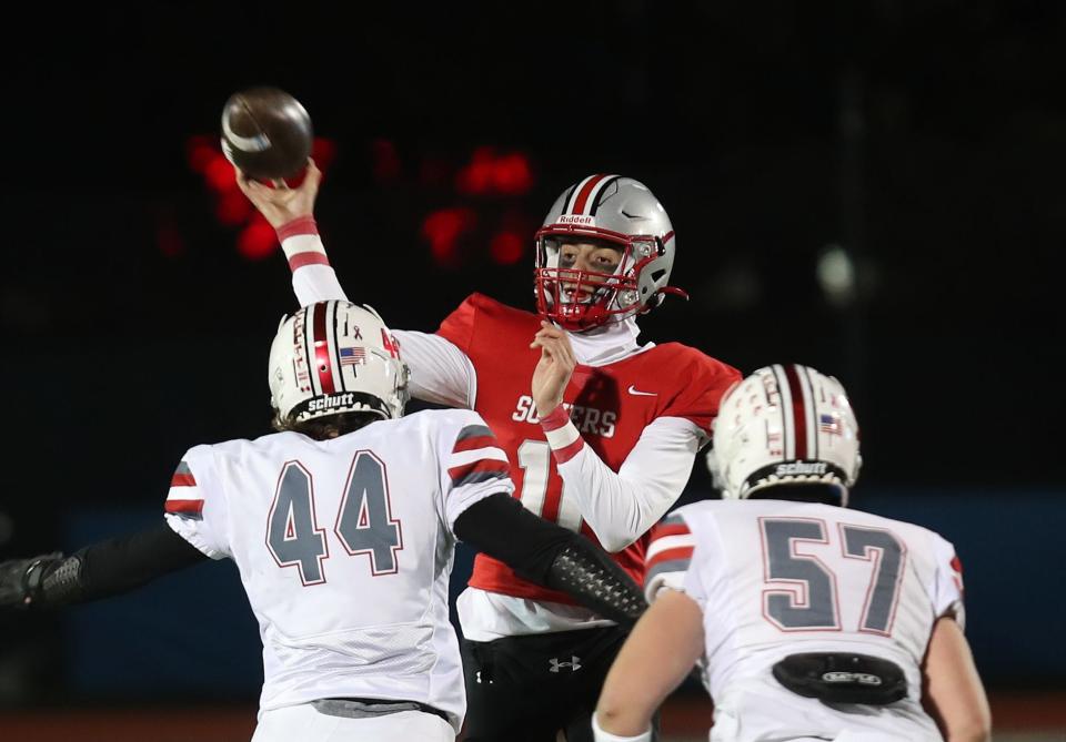 Somers quarterback Matt Fitzsimons (10) completes a pass to teammate Luke Savino for a first half touchdown against Niskayuna during the Class A football state semifinal at Middletown  High School Nov. 25, 2022. Somers won the game 35-7.