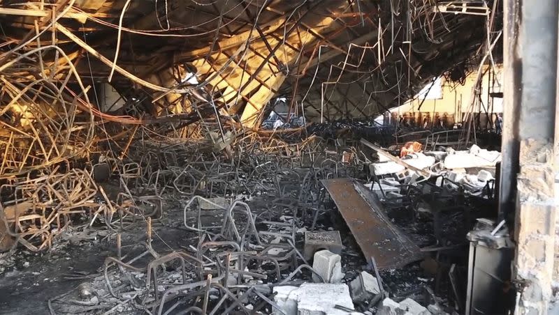 This image made from video shows debris at the site of a fatal fire in the district of Hamdaniya, Nineveh province, Iraq, Wednesday, Sept. 27, 2023. A fire that raced through a hall hosting a Christian wedding in northern Iraq killed multiple people, authorities said Wednesday. 