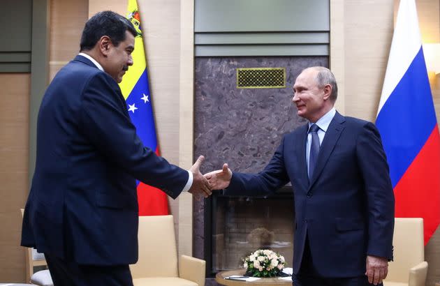 Nicolás Maduro and Venezuela have deepened ties to Russia and Vladimir Putin since the U.S. imposed heavy sanctions on the South American country, which have also benefited Russia's oil industry. (Photo: Valery Sharifulin via Getty Images)