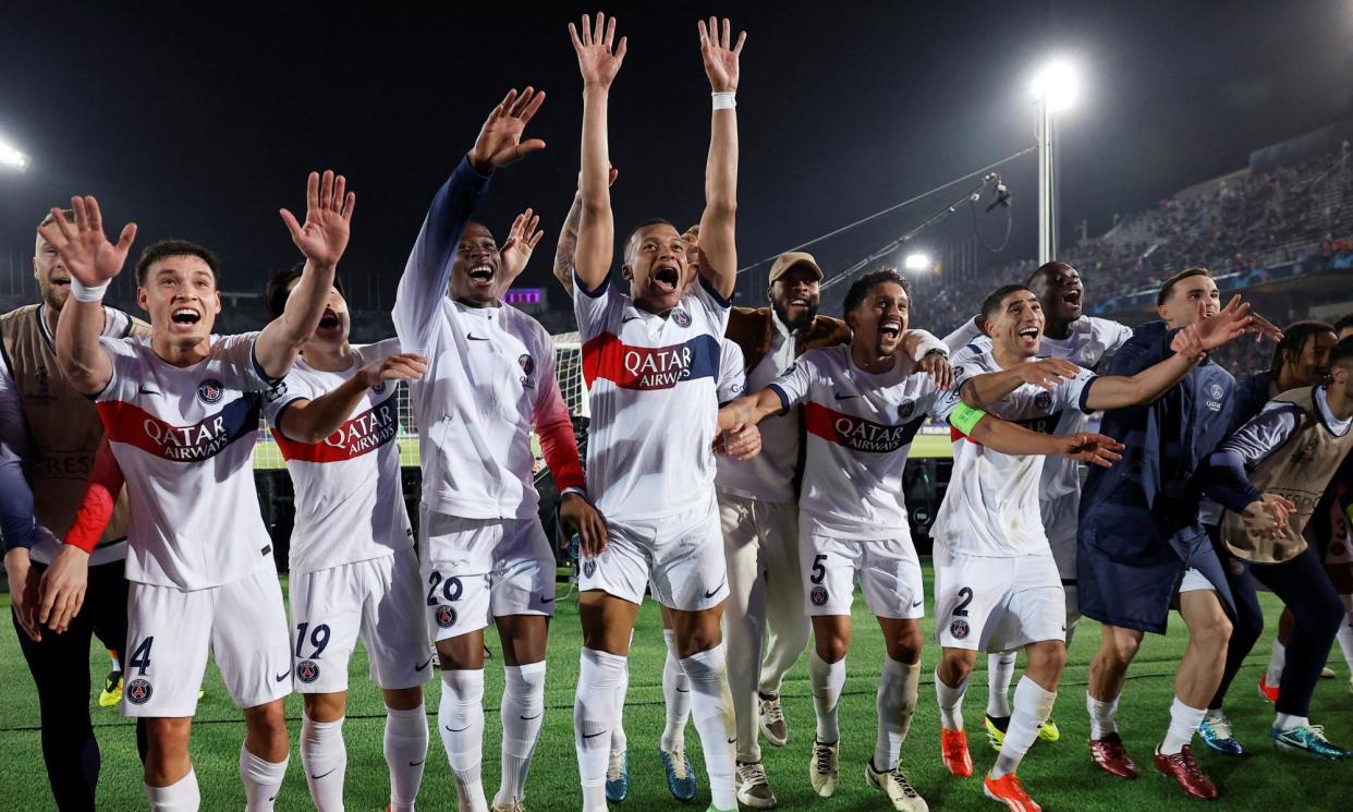 <span>Kylian Mbappé (centre) and his PSG teammates dance and celebrate their stunning comeback victory at Barcelona.</span><span>Photograph: Juan Medina/Reuters</span>