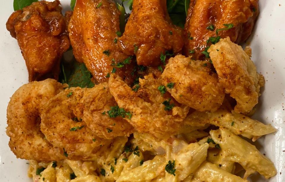 Wings, shrimp and lobster mac and cheese are among the most popular dishes at Cuzzo’s Cuisine.