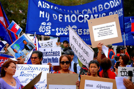 Protesters hold placards and banners during a demonstration against Cambodia's Prime Minister Hun Sen, who is attending the one-off summit of 10-member Association of Southeast Asian Nations (ASEAN), in Sydney, Australia March 16, 2018. REUTERS/David Gray