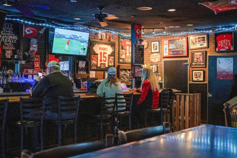 Various Kansas City Chiefs-themed trinkets adorn the walls at Pub Rock on Thursday, Feb. 8, 2024, in Scottsdale, Ariz. Nancy Stevens, the owner of Pub Rock, said that most of the items the bar has acquired have been given to her by Kansas City Chiefs fans who have visited.