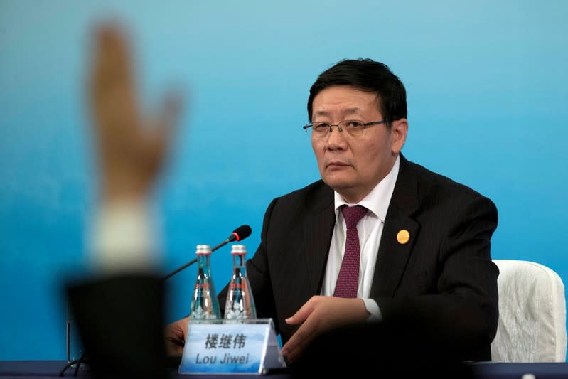 China's Minister of Finance Lou Jiwei attends a press conference held at the close of the G20 Finance Ministers and Central Bank Governors meeting in Chengdu in Southwestern China's Sichuan province