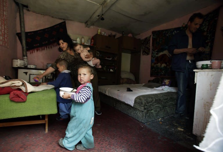 A family prepares lunch at their home in Miskolc, Hungary on April 22, 2012. In a 2012 report Hungary's National Health Institute revealed that over 14% of Hungarian children suffer from malnutrition