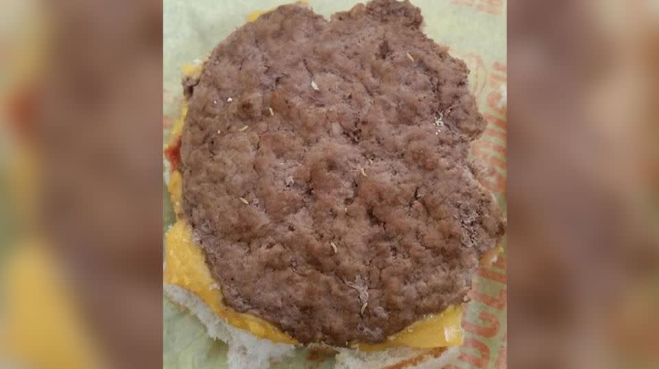 Emmi McHugh's three-year-old son had already tucked into his Happy Meal burger when she discovered something that wasn’t listed on the menu. Source: Facebook