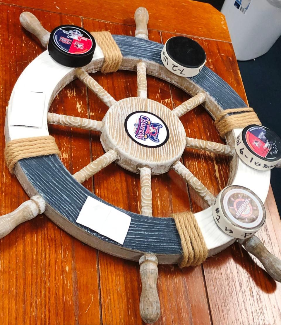 The Peoria Rivermen have a riverboat wheel to which they add a puck after each victory in the SPHL playoffs. They've won two rounds and are headed to the President's Cup Final, where they need two more wins to be champions.