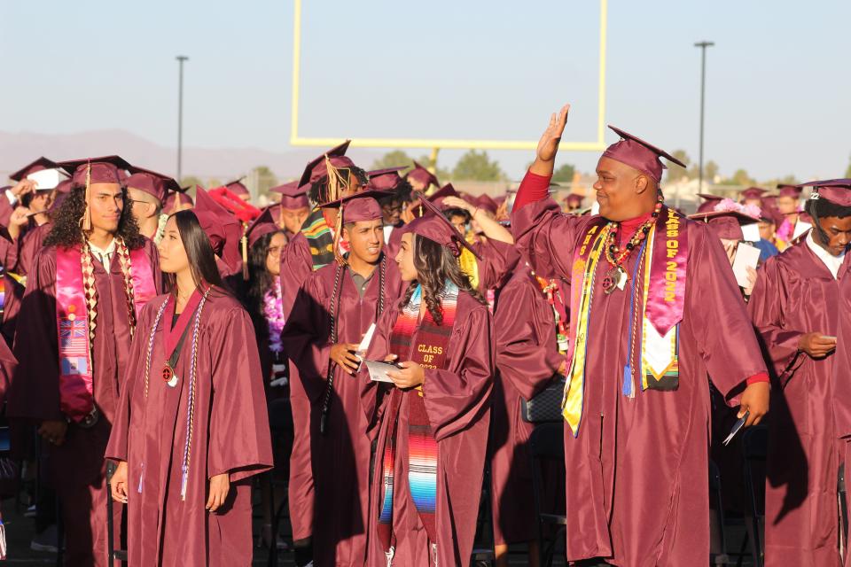 Adelanto High School Class of 2022 seniors celebrate at their graduation ceremony last spring. Although the school has a high graduation rate, AHS is looking to improve its college readiness through the newly launched Heritage Program.