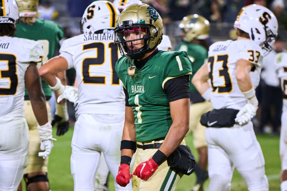 Basha Bears running back Miles Lockhart (1) celebrates a touchdown against the Saguaro Sabercats during the Open Division state championship game at Sun Devil Stadium in Tempe on Saturday, Dec. 10, 2022.