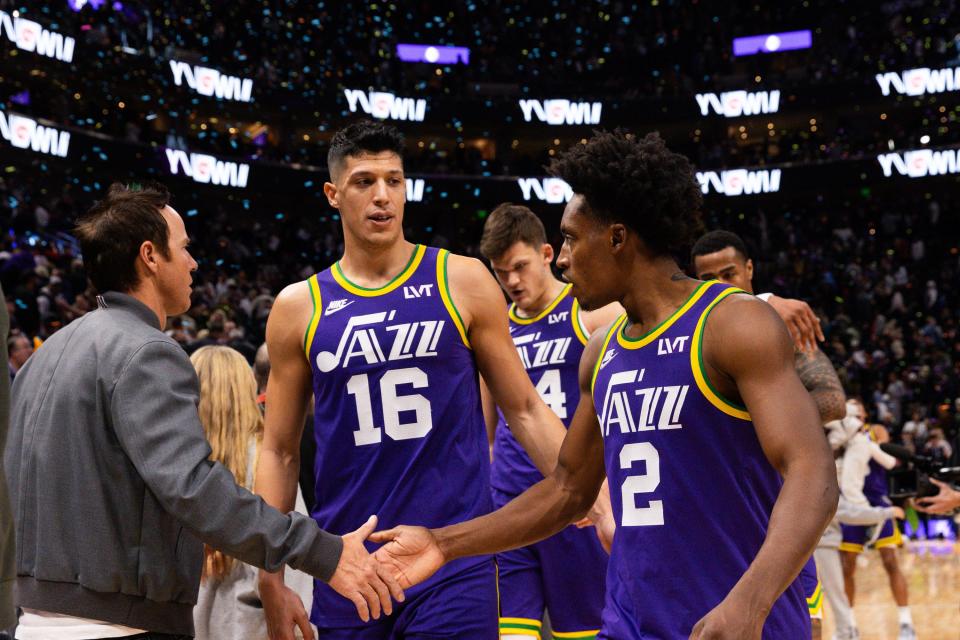 Utah Jazz teammates Simone Fontecchio (16) and Collin Sexton (2) walk off the court after their 114-112 win over the New Orleans Pelicans at the Delta Center in Salt Lake City on Monday, Nov. 27, 2023. | Megan Nielsen, Deseret News