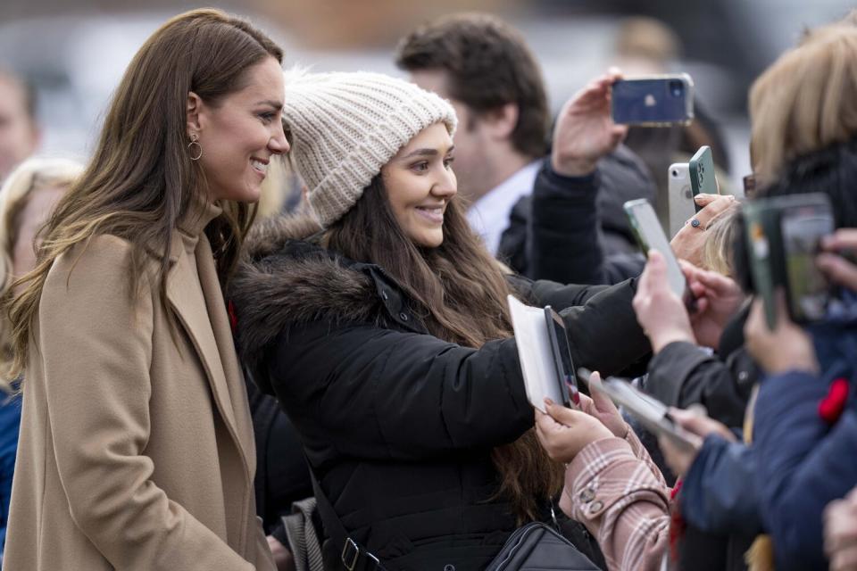 Catherine, Princess of Wales meets members of the public and takes selfies after a visit to The Street - a community hub that helps local organisations to grow and develop their services on November 3, 2022 in Scarborough