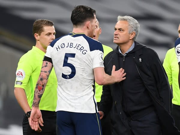 Tottenham Hotspur midielder Pierre-Emile Hojbjerg with manager Jose Mourinho  