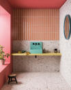 <p> You can rely on just bathroom floor tiles alone to bring interest into your bathroom. We love how the vibrant coral looks against the very stylish terrazzo here. The stripped backspace and lack of any clutter mean the tiles don't totally overwhelm the room and they are the sole focus. Definitely take that tip – if you go big on the tiles, keep everything else pretty simple. </p>