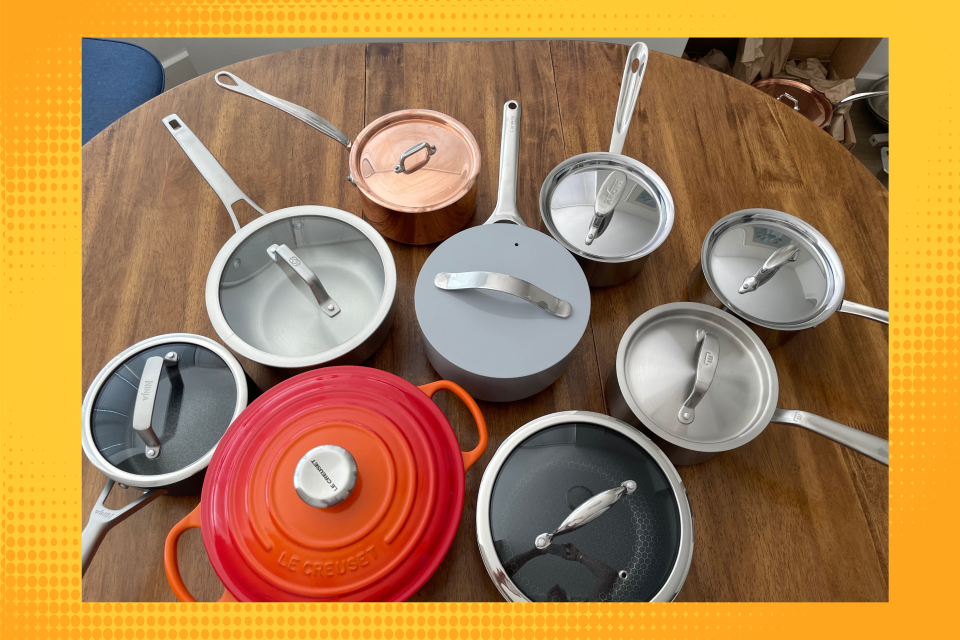 Assortment of pots with lids on a table